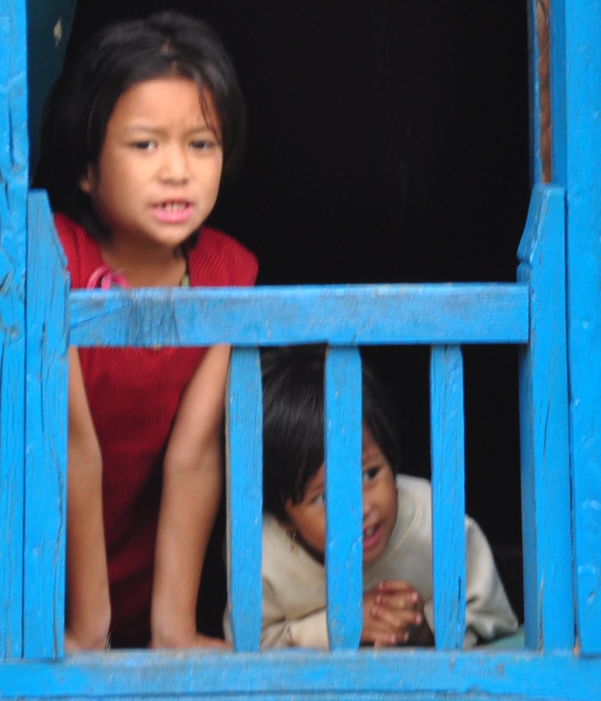 kids in a window